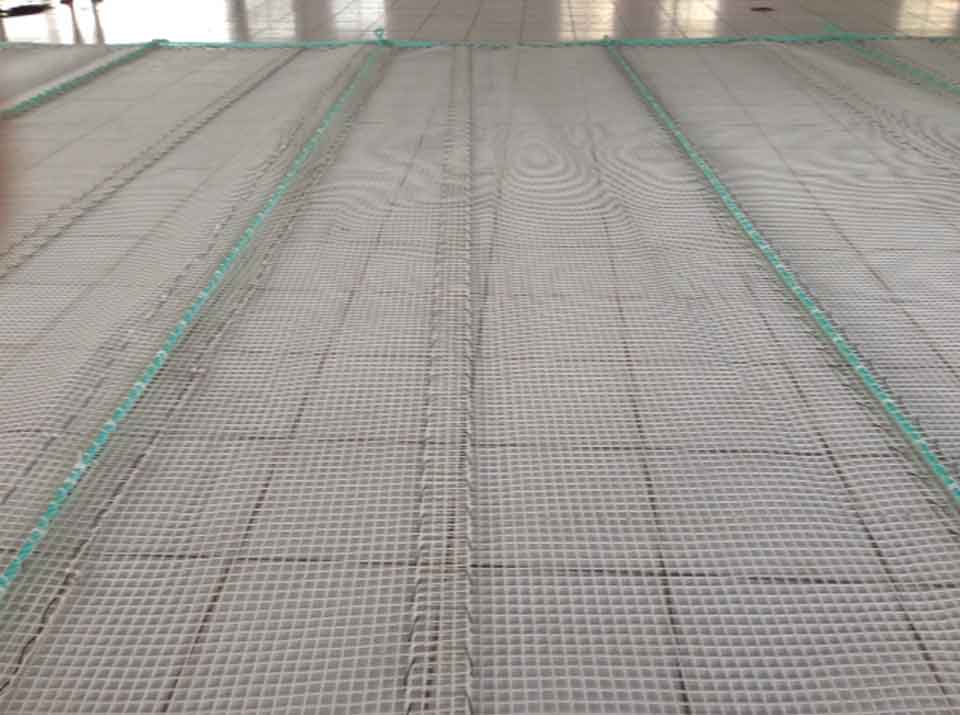KGrid net panel laid out flat on the workshop floor