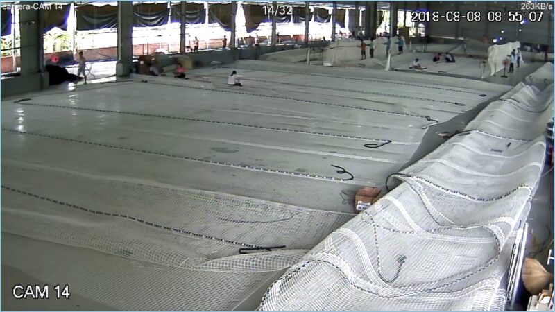 KGrid net panels laid out across the workshop floor